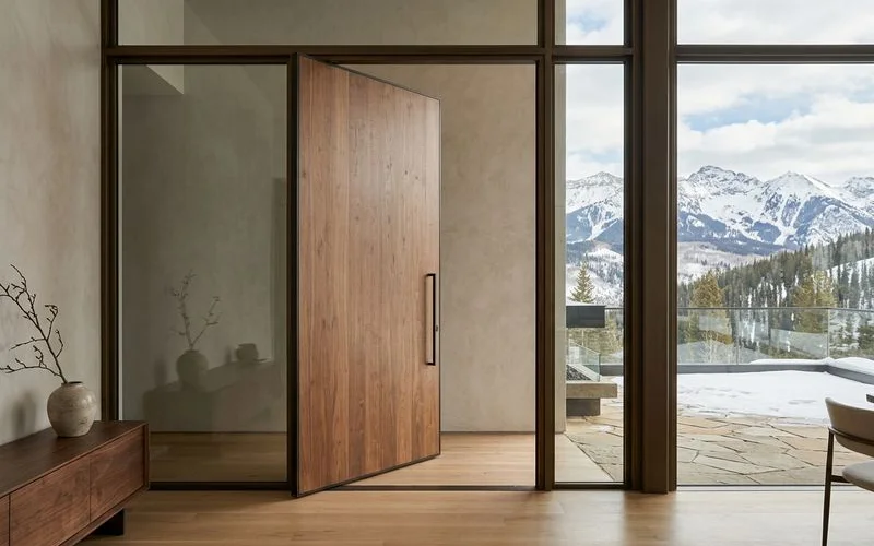 Minimalist showroom vignette of a finished door panel against a neutral wall