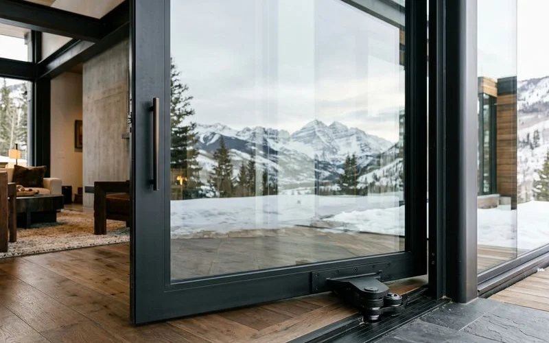 Refined detail of premium pivot hardware and finish, conveying quality and value